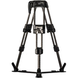 A carbon fiber tripod with black plastic joints and accessories, shown fully extended on a solid white background.