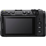 The rear view of a black digital camera showing its control buttons and LCD screen on a solid white background.