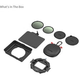Camera lens filters and accessories on a white background