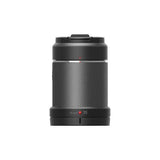 Sony 50mm f/1.4 GM lens in black, featuring a textured grip pattern, a red distance scale, and a red Sony logo on the front.