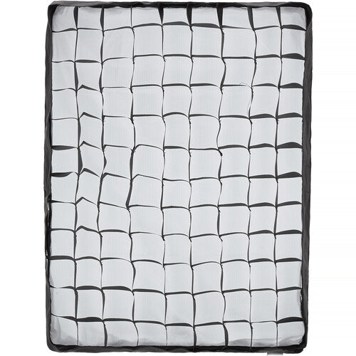 Grid-patterned mat with black and white squares on a white background