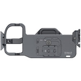 Black camera accessory on a white background
