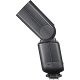 Black camera flash on a white background