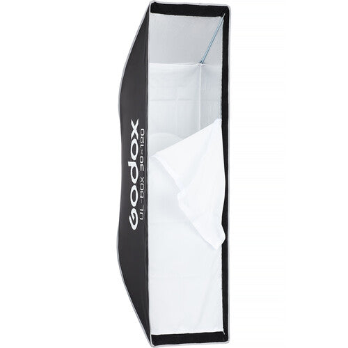 A Godox softbox studio light with a black exterior and white interior, shown open on a solid white background.