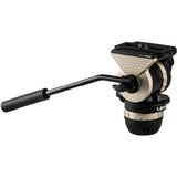 A Uni-Met 1/2" fluid head camera tripod mount with a black handle grip and a textured beige and black body, shown on a solid white background.