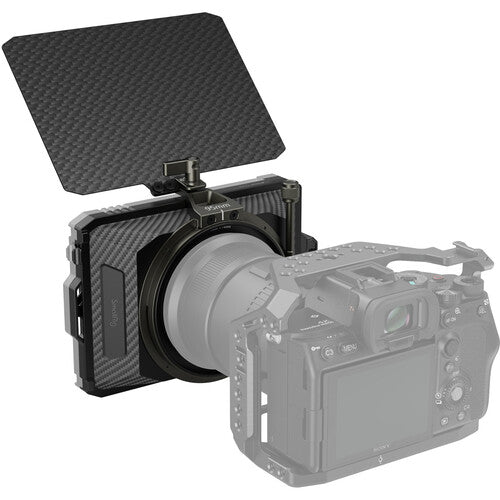 Camera with a protective carbon fiber cover on a white background