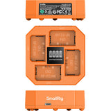 Orange battery charger with multiple slots and 'SmallRig' branding on a white background