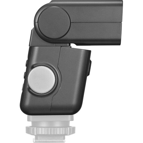 Black camera flash with white base on a white background