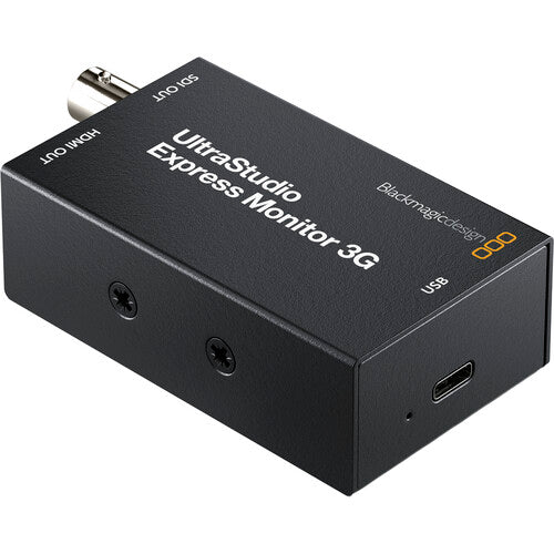 Black magicdesign UltraStudio Express Monitor 3G audio device in black with white text and a small orange logo, shown on a white background.