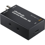 Black magicdesign UltraStudio Express Monitor 3G audio device in black with white text and a small orange logo, shown on a white background.