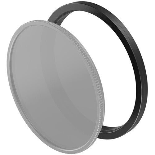 Gray camera lens filter with black metal ring on a white background