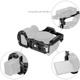 Black and white electronic device with multiple components on a white background