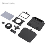 A camera lens protector kit laid out on a white background, including a textured black front cover, a rectangular black frame piece, a circular black ring, small mounting hardware, a gray cleaning cloth, and a small black rubber piece. Text in the upper left reads 'Package Includes'.