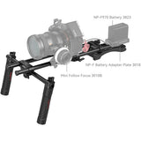 Camera rig with labeled components on a white background