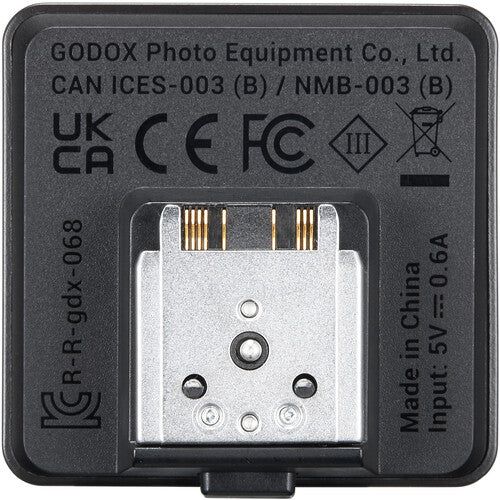 Godox photo equipment connector with certification logos on a black background