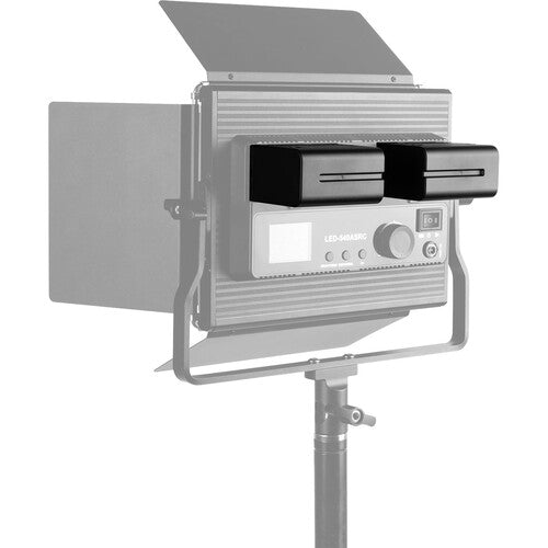 Studio light with adjustable shade on a white background