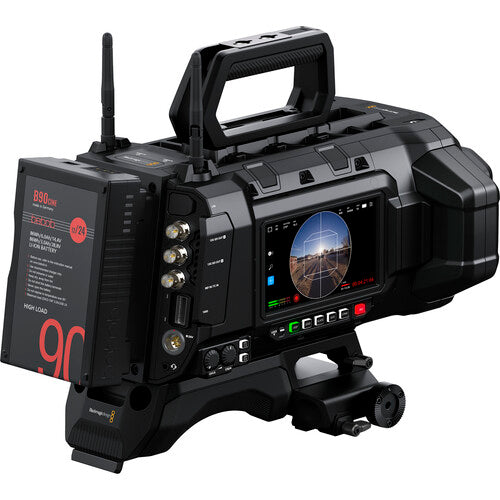Black video camera with screen displaying a viewfinder on a white background