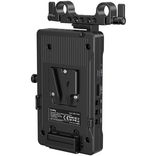 Black camera battery plate with multiple ports on a white background