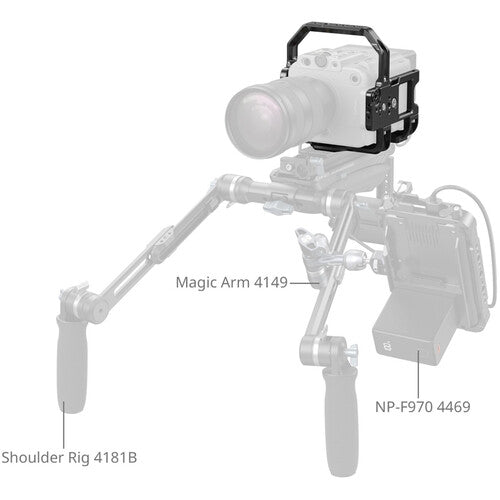 A grayscale product diagram showing a camera rig setup with labeled parts: Shoulder Rig 4181B on the left, Magic Arm 4149 in the center, and NP-F970 4469 on the right, plus a camera mounted on top.