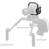 A grayscale product diagram showing a camera rig setup with labeled parts: Shoulder Rig 4181B on the left, Magic Arm 4149 in the center, and NP-F970 4469 on the right, plus a camera mounted on top.
